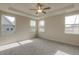 Spacious bedroom featuring trey ceiling and large windows for lots of natural light at 1749 Daiquiri Turn, Sanford, NC 27332