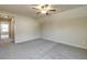 Comfortable bedroom with neutral carpet, ceiling fan and natural light at 1749 Daiquiri Turn, Sanford, NC 27332