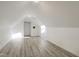 Bright bedroom featuring laminate flooring and a window at 206 Steep Bank Dr, Cary, NC 27518
