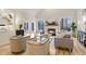Cozy living room with fireplace, built-in shelves, and an abundance of natural light at 206 Steep Bank Dr, Cary, NC 27518