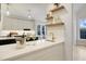 Stylish wet bar with wine cooler, ample counter space, and convenient sink at 206 Steep Bank Dr, Cary, NC 27518