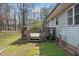 Backyard deck with statues adding charm and character to the outdoor space at 245 Cedar Crk Rd, Franklinton, NC 27525