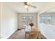 Bright dining room with neutral walls, a wood table, and French doors leading to the deck at 245 Cedar Crk Rd, Franklinton, NC 27525