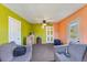 Comfortable living room showcasing basic furnishings, neutral paint, and dual access doors at 245 Cedar Crk Rd, Franklinton, NC 27525