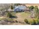 Charming home nestled on a lush lot with mature trees, offering privacy and scenic views at 2490 Earpsboro Rd, Zebulon, NC 27597