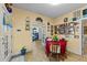 Cozy breakfast nook with table and chairs, wall decor, and a doorway to another room at 2490 Earpsboro Rd, Zebulon, NC 27597