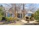Charming home with a well-manicured lawn and blooming plants, creating a welcoming curb appeal at 2490 Earpsboro Rd, Zebulon, NC 27597