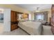 Beautiful main bedroom features a king size bed with attached headboard and matching curtains at 2490 Earpsboro Rd, Zebulon, NC 27597