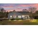 Spacious backyard featuring a cozy deck perfect for outdoor relaxation and entertainment at 2490 Earpsboro Rd, Zebulon, NC 27597