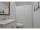 Cozy bathroom featuring a classic vanity and ample lighting at 2836 Oberlin Rd, Raleigh, NC 27608