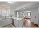 Open-concept layout with a view from the kitchen to the dining area and inviting living space at 2836 Oberlin Rd, Raleigh, NC 27608
