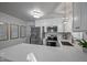 Modern kitchen with stainless steel appliances, white cabinets, and quartz countertops at 2836 Oberlin Rd, Raleigh, NC 27608