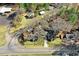 Aerial view of the property showcasing its location, driveway, and surrounding neighborhood at 2867, 2851 Nc-210 & Galilee Hwy, Smithfield, NC 27577