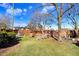 Spacious grassy back yard with mature shade trees and outdoor seating at 2867, 2851 Nc-210 & Galilee Hwy, Smithfield, NC 27577