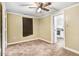 Bedroom with neutral walls, carpet flooring, ceiling fan, and one window at 2867, 2851 Nc-210 & Galilee Hwy, Smithfield, NC 27577