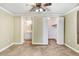 Bedroom with carpet, ceiling fan, two closets, and an attached bathroom at 2867, 2851 Nc-210 & Galilee Hwy, Smithfield, NC 27577