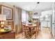 This dining room features a round wooden table with seating for four at 2867, 2851 Nc-210 & Galilee Hwy, Smithfield, NC 27577