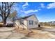 Rear exterior showcasing gravel driveway and the home's architectural style at 2867, 2851 Nc-210 & Galilee Hwy, Smithfield, NC 27577