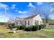 Attractive home with manicured lawn, mature trees, and classic architectural details at 2867, 2851 Nc-210 & Galilee Hwy, Smithfield, NC 27577