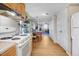 Bright kitchen showcasing appliances and an open view to the dining area at 2867, 2851 Nc-210 & Galilee Hwy, Smithfield, NC 27577