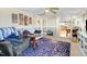Cozy living room features unique artwork and a ceiling fan, creating a comfortable space at 2867, 2851 Nc-210 & Galilee Hwy, Smithfield, NC 27577