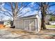 Detached shed with white trim in the back yard at 2867, 2851 Nc-210 & Galilee Hwy, Smithfield, NC 27577