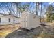 Backyard view of the property's storage shed with double doors at 2867, 2851 Nc-210 & Galilee Hwy, Smithfield, NC 27577