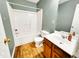 Bathroom featuring a vanity, toilet, and shower with tub at 401 Maymount Dr, Durham, NC 27703