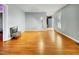 Expansive living room with hardwood floors offering ample space and an inviting entrance at 401 Maymount Dr, Durham, NC 27703