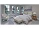 Bedroom with a large bed, lots of natural light, and lake views at 4308 Windsor Pl, Raleigh, NC 27609
