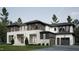 Stunning exterior elevation of a two-story home with a mix of modern and classic design at 4308 Windsor Pl, Raleigh, NC 27609