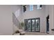 Bright foyer featuring soaring ceilings, an elegant staircase, and ample natural light at 4308 Windsor Pl, Raleigh, NC 27609