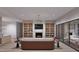 Spacious living room with built-in bookshelves, a fireplace, and a view into the outdoor living space, perfect for gatherings at 4308 Windsor Pl, Raleigh, NC 27609