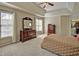 Comfortable main bedroom with plush carpeting, large windows and a neutral palette for a cozy retreat at 5008 Casland Dr, Raleigh, NC 27604