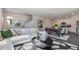 Spacious open floor plan connecting living room, dining area, and modern white kitchen at 515 Old Battle Bridge Rd, Wendell, NC 27591