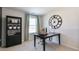 Office showing a black desk, modern shelving, and a calming workspace at 515 Old Battle Bridge Rd, Wendell, NC 27591