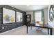 Office showcasing decorative wall art, patterned wallpaper and a comfortable workspace at 515 Old Battle Bridge Rd, Wendell, NC 27591