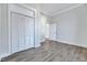 Bedroom featuring hardwood floors, a closet, and neutral paint colors at 57 Lowell Ct, Smithfield, NC 27577