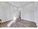 Spacious bedroom with hardwood floors and ample natural light at 57 Lowell Ct, Smithfield, NC 27577