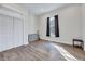 Bedroom with hardwood floors, large window and closet at 57 Lowell Ct, Smithfield, NC 27577