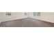 Spacious living room featuring luxury vinyl plank flooring and bright, natural light at 6024 Sodium St, Raleigh, NC 27610