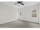 This bedroom offers two windows providing lots of natural light and a ceiling fan to keep cool at 704 East St, Smithfield, NC 27577