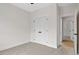 Bright bedroom with large closets with views of the hall and bathroom at 704 East St, Smithfield, NC 27577