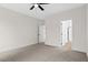 A well-lit bedroom provides a view to other parts of the home through open doorways at 704 East St, Smithfield, NC 27577