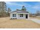 Beautiful single-story home with a tidy lawn and welcoming front entrance at 704 East St, Smithfield, NC 27577
