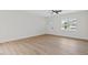 Inviting living area featuring clean white walls, modern floors, and a front door at 704 East St, Smithfield, NC 27577