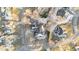 Aerial view of a home surrounded by snow-covered lawns and mature trees at 101 Mantle Dr, Clayton, NC 27527