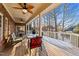 Large deck provides an outdoor living space, complete with outdoor furniture and a grill at 101 Mantle Dr, Clayton, NC 27527