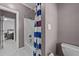 Neutral bathroom featuring a shower/tub combo and neutral paint at 101 Mantle Dr, Clayton, NC 27527