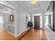 Elegant foyer with hardwood floors, archway, and decorative trim at 101 Mantle Dr, Clayton, NC 27527